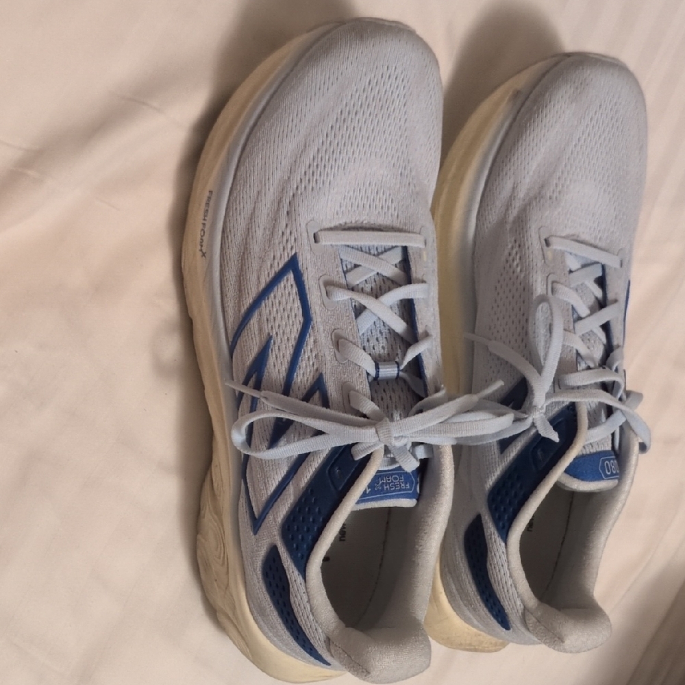 New Balance Light Blue and White Sneakers
